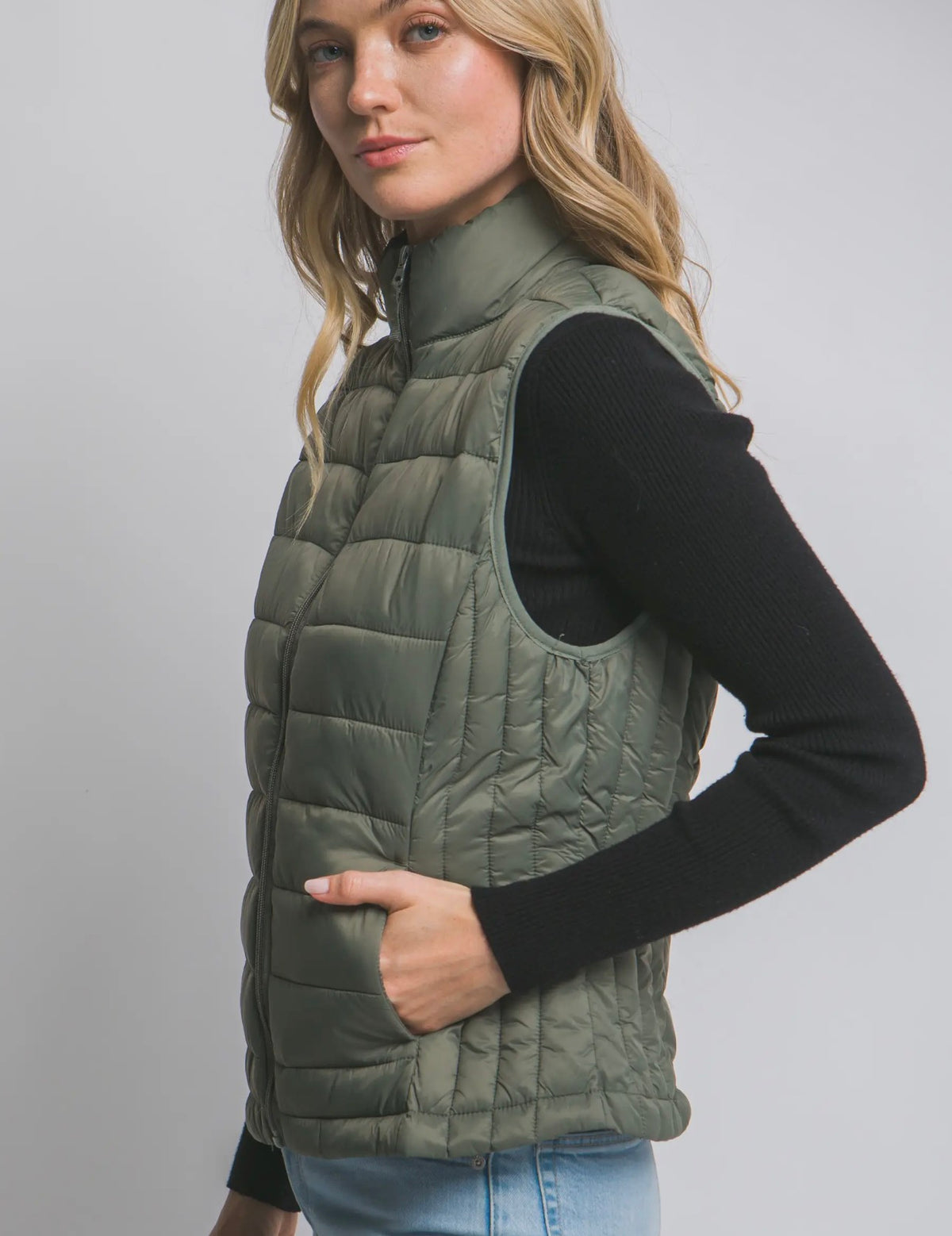 Forest green puffer vest with bag