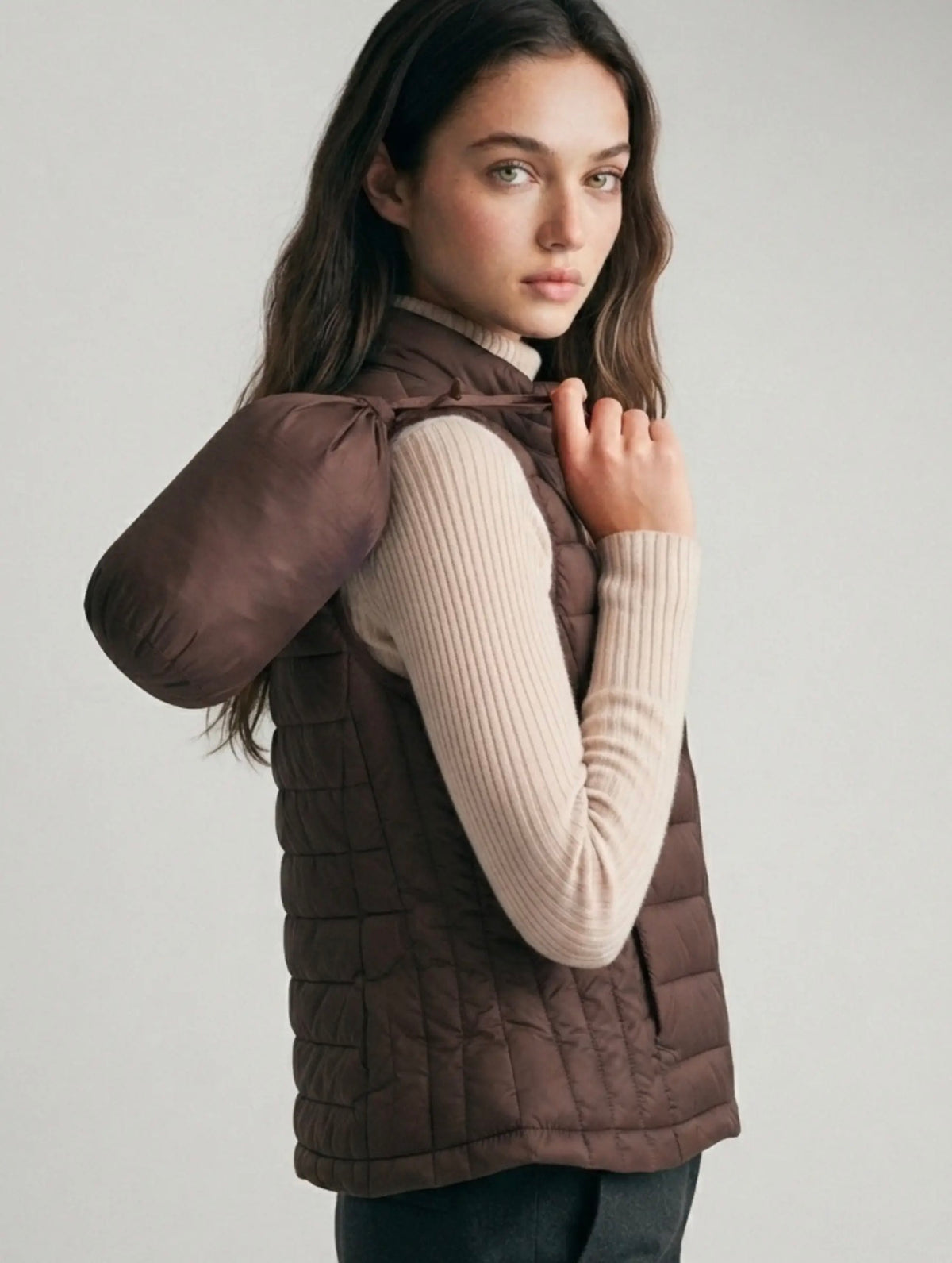 Brown puffer vest with bag